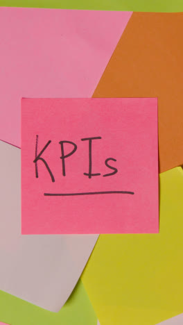 Vertical-Video-Business-Concept-Of-Revolving-Sticky-Notes-With-KPIs-Written-On-Top-Note-1